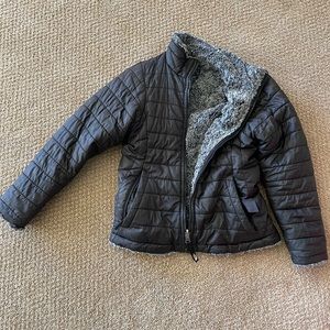 Girls Mossbud North Face black gray reversible size 7-8 used. Smoke free home.